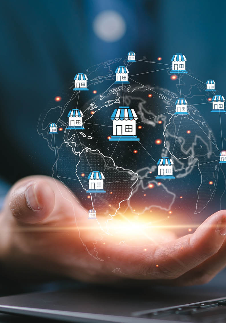 A person's hand is shown on a laptop keyboard, with a globe and many dots surrounding it. AI generated content