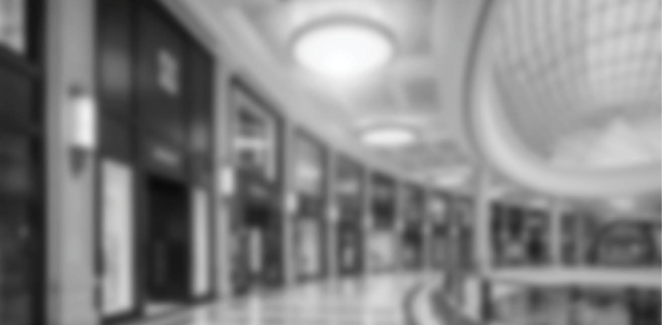 A large building with a large circular light fixture in the center. AI generated content