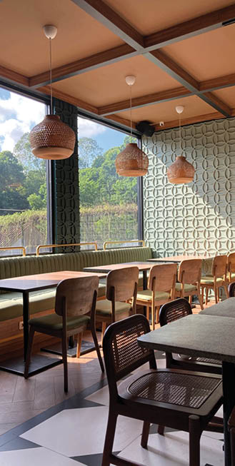 A restaurant with a wooden ceiling and a table with chairs. AI generated content