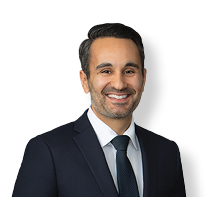 A man in a suit and tie is smiling for the camera. AI generated content