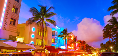 Miami Beach South Beach sunset in Ocean Drive Florida Art Deco and car lights