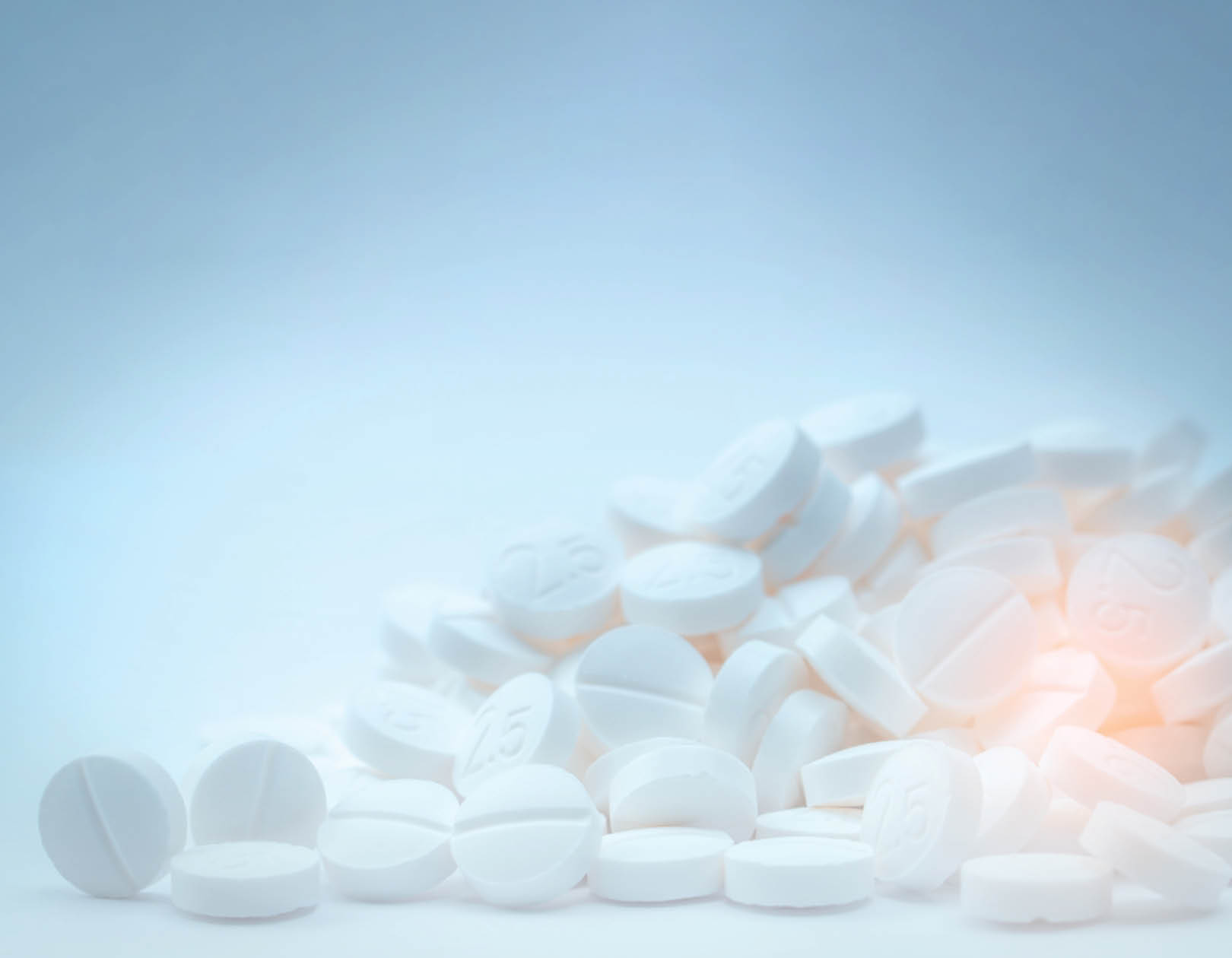 Pile of white tablets pills. Bronchodilator drug for treatment asthma. Pharmaceutical industry. Global Healthcare. Health and medicine policy concept. Pharmacy products. Pharmaceutical production.