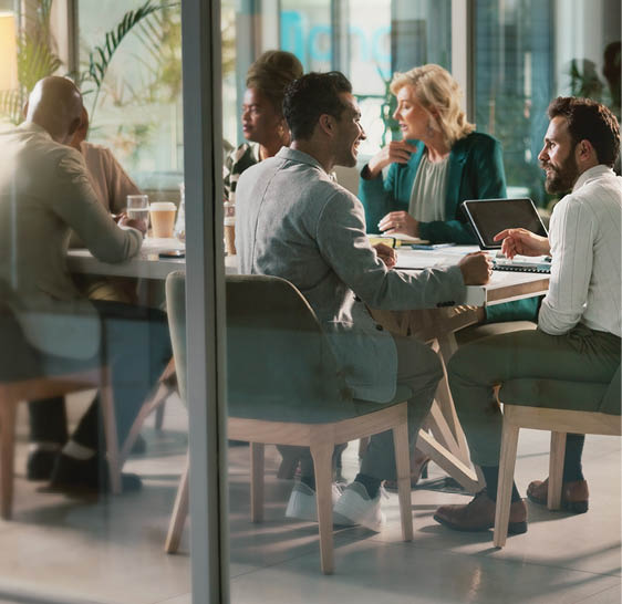 Business, people and meeting with laptop in boardroom for project research, teamwork and budget discussion. Staff, communication and report for proposal of planning, information and finance feedback