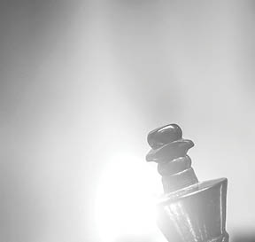 Businessman moving chess piece on chess board game concept for ideas and competition and strategy, business success concept, business competition planning teamwork strategic concept. 