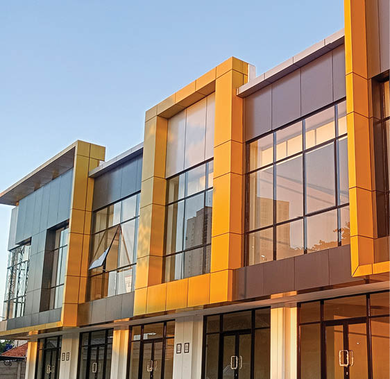 A row of luxury shophouses with a modern minimalist architectural design.